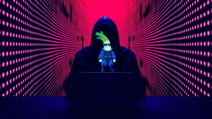 A hooded figure sits before a laptop displaying a small green-haired character in sunglasses, set against a vivid pink and black background with a radiating dot pattern—evoking the secretive, cyber-themed aesthetic of the elusive hacker group tied to the GTA 6 leak and cryptocurrency theft.