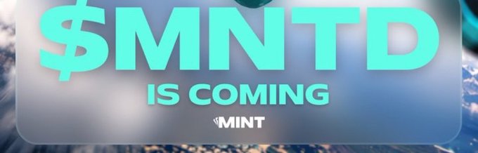 A promotional graphic with teal text reading '$MNTD IS COMING' along with the MINT logo on a blurred background.