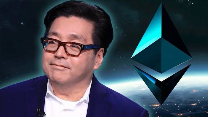 A man in a blue suit jacket and glasses positioned next to a large Ethereum logo against a space-themed background.