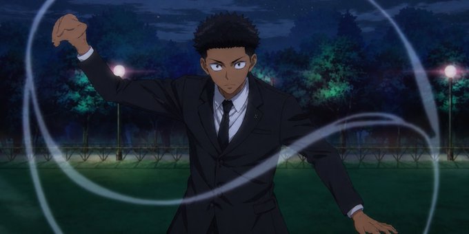 An animated scene shows a young man in a black suit performing what appears to be a magic trick, with swirling ribbons or threads flowing around him in an outdoor nighttime setting.