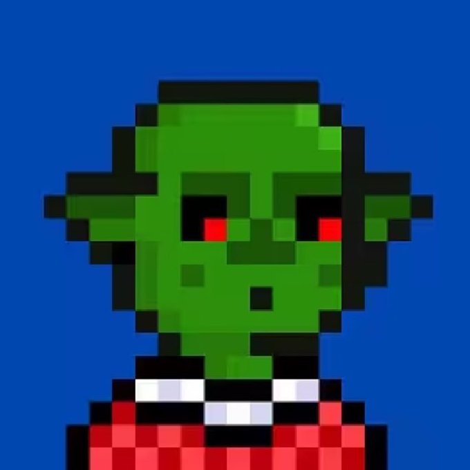 A pixel art portrait of a green-skinned goblin with red eyes, pointed ears, and a red checkered shirt on a blue background, representing one of the 2,222 goblin PFP NFTs on ApeChain.