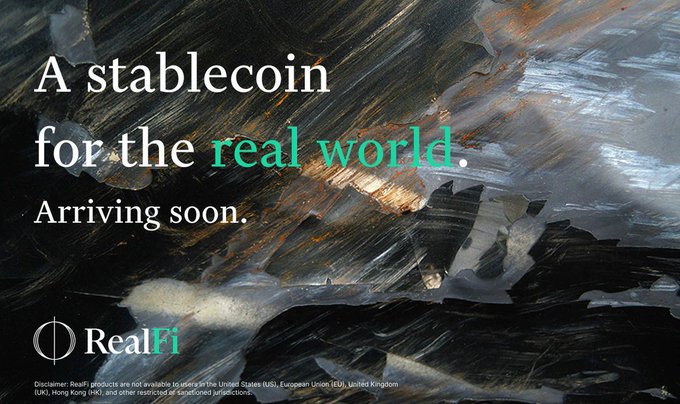 A promotional advertisement for 'RealFi' with the text 'A stablecoin for the real world. Arriving soon.' displayed over an abstract painted background.
