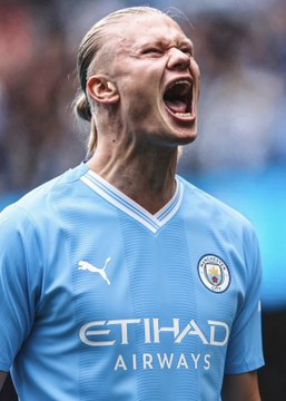 A Manchester City player, wearing the team's light blue "Etihad Airways" jersey with Puma branding, shouts passionately in what appears to be an intense moment of a match. The image supports the news of a high-stakes $400,000 bet on Manchester City to win against Crystal Palace on Polymarket, capturing the kind of fierce determination that bettors are banking on.