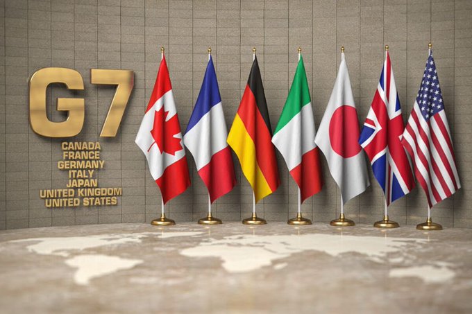 A graphic displays the G7 logo alongside the flags of Canada, France, Germany, Italy, Japan, the United Kingdom, and the United States above a world map.