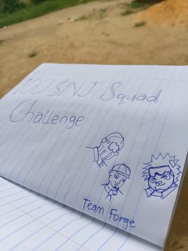 The image features a piece of paper with some drawings or doodles, including cartoon faces, on it. The text "I did a lil thing for us at team forge [ @0xOnyedika , @devendyyy and @BiggyofWeb3 ]" is written below the paper. This suggests that someone has drawn these images to accompany a post or message about a project called "Team Forge".