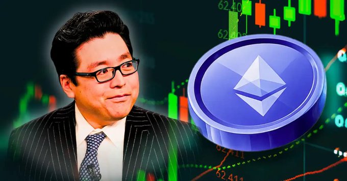 A man in a pinstripe suit and glasses stands beside a large Ethereum (ETH) coin against a candlestick chart backdrop, illustrating the post's claim about BitMine's massive ETH accumulation of 52,203 ETH bringing holdings to 5.67M ETH.