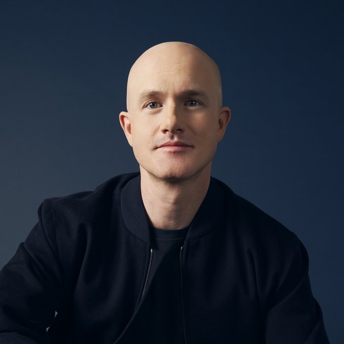 A professional headshot of Brian Armstrong, CEO of Coinbase, pictured against a dark blue backdrop wearing a black jacket. The image accompanies his statement that onchain reputation will become "the new FICO score."