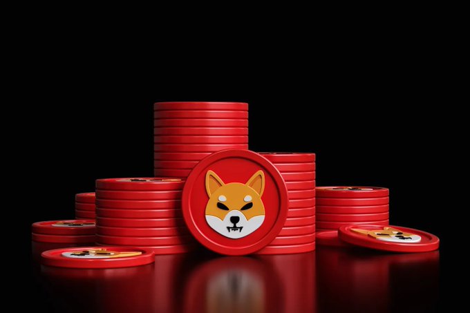 A collection of red Shiba Inu (Shib) cryptocurrency chips/coins are stacked together against a black background, with the central chip featuring the iconic Shiba Inu dog face logo.