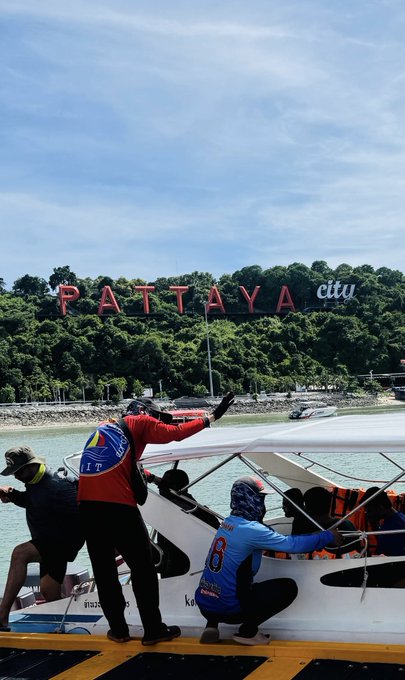 The image shows people boarding a speedboat with the "PATTAYA city" sign visible on a hillside in the background, matching the post's setting of the author being in Pattaya. The image ties into the travel/location aspect of the caption rather than the cricket betting commentary about the Lanka Premier League.