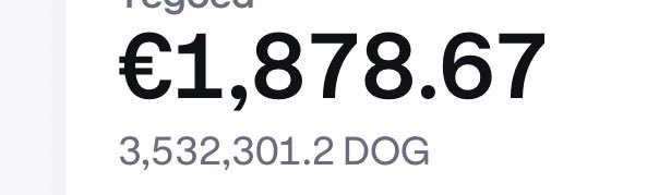 A financial display showing a projected amount of €1,878.67 equivalent to 3,532,301.2 DOG.