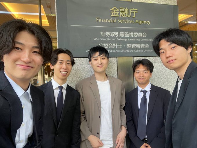 Five men in business attire pose together outside the Financial Services Agency (金融庁) in Japan, with a sign in the background also identifying the SESC Securities and Exchange Surveillance Commission and CPA Public Accountants and Auditing Oversight. The image appears to capture the Nyx Foundation team during their visit to meet with the FSA to discuss topics like post-quantum cryptography migration, blockchain technology, and MEV as mentioned in the post.