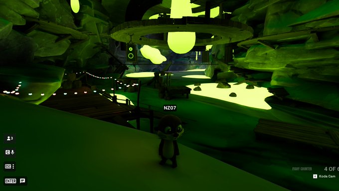 A screenshot from the game of the Infinite Monkey, showing a small monkey character labeled 'NZ07' standing in a green-lit cave environment with glowing ponds, a wooden walkway, and an ornate hanging chandelier overhead.