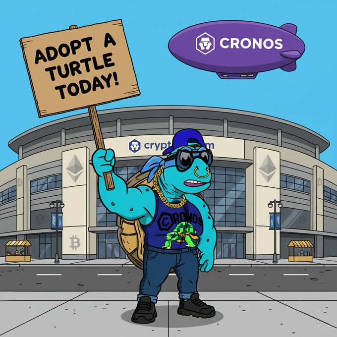 A cartoon turtle character wearing a Cronos tank top, sunglasses, and a gold chain holds an 'ADOPT A TURTLE TODAY!' sign in front of the Crypto.com stadium, with a purple Cronos blimp in the sky.