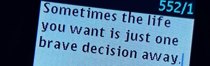 A pixelated screen displays the text: 'Sometimes the life you want is just one brave decision away.' with '552/1' visible in the corner.