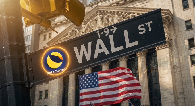 A Wall Street sign with the number 1-9, featuring a Terra Classic cryptocurrency logo overlaid, with the New York Stock Exchange building and American flag visible in the background.