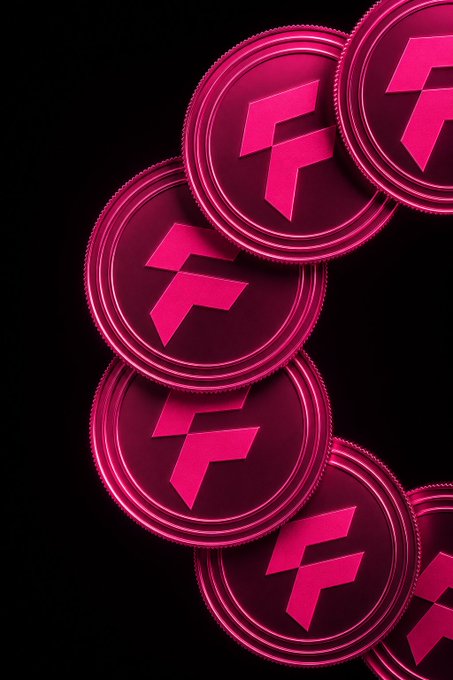 A stack of pink and magenta 3D coins featuring the 'F' logo, representing the Falcon Finance cryptocurrency token.
