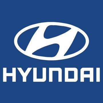 The image displays the Hyundai logo, featuring a stylized "H" inside an oval, with "HYUNDAI" text beneath it on a blue background. The logo represents Hyundai Card, which is reportedly exploring Avalanche blockchain technology for compliance and after-hours banking transactions.