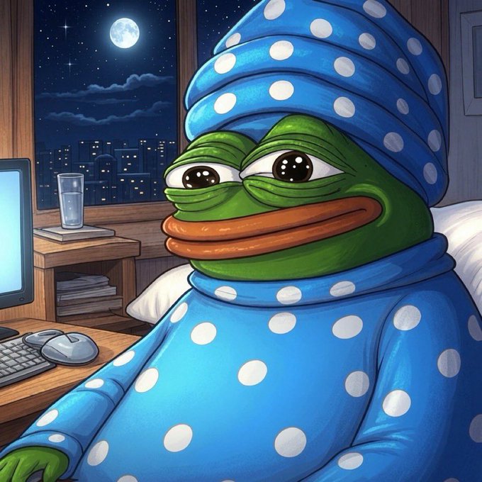 An illustration of a sad-looking Pepe the Frog character wearing a blue polka-dot nightcap and matching pajamas, sitting in a bedroom with a moonlit city view through the window.
