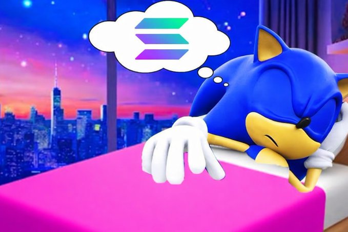 A 3D render of Sonic the Hedgehog sleeping in bed with a thought bubble showing the Solana logo, with a city skyline visible through the window at dusk.