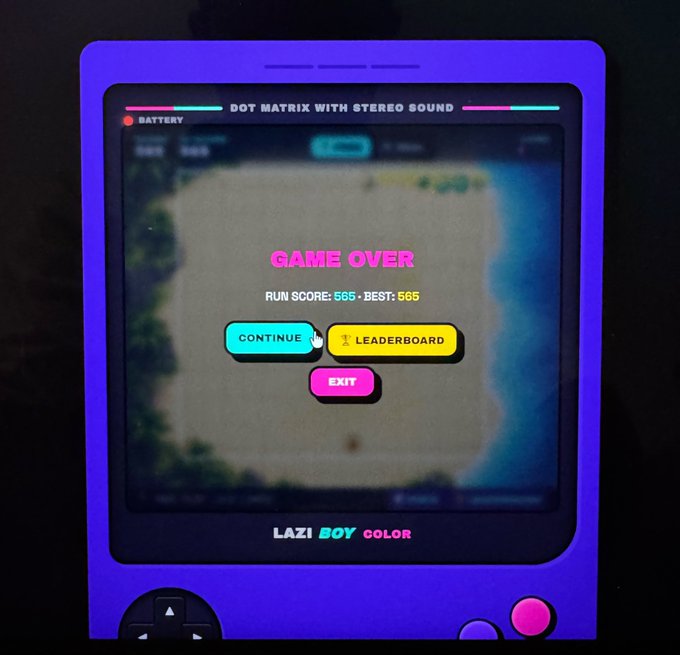A digital or printed illustration of a purple handheld gaming device with a game over screen displaying 'RUN SCORE: 565 • BEST: 565' and 'LAZY BOY COLOR' branding on the device.