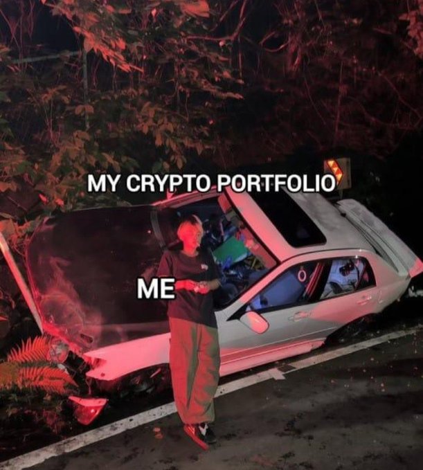 The image shows a person standing next to a wrecked white car at night, with the captions "MY CRYPTO PORTFOLIO" over the vehicle and "ME" over the person, humorously illustrating the post's point about reckless trading destroying their investments.