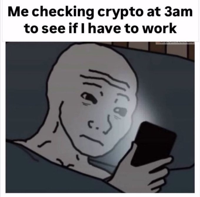 A meme with text 'Me checking crypto at 3am to see if I have to work' over the 'doomer' character illuminated by a phone screen.