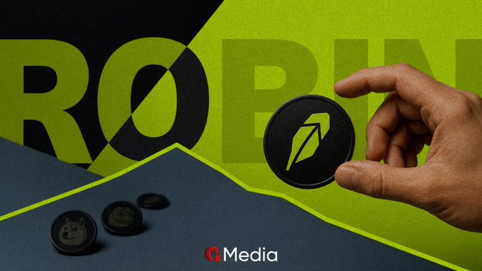 A hand holds a green and black token featuring a rocket/diamond logo, with "ROBIN" text prominently displayed in the background, alongside smaller tokens bearing a Shiba Inu dog face design, visually representing Robinhood Chain's dominant memecoin trading activity referenced in the caption.
