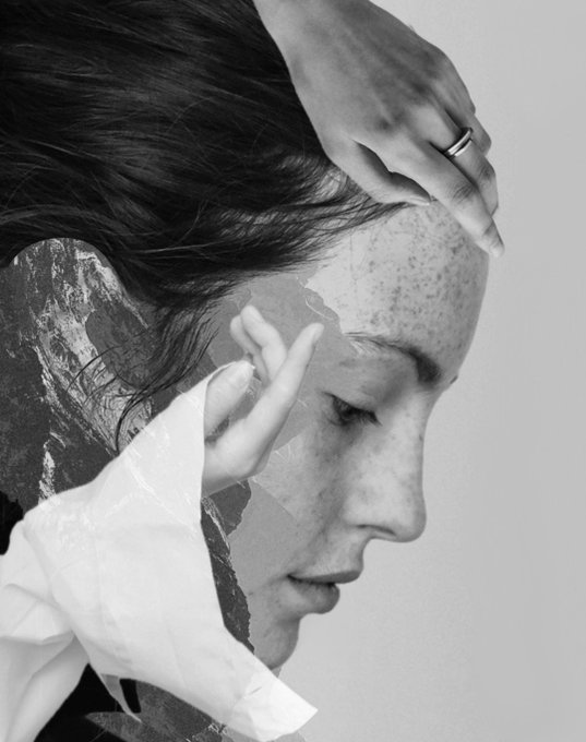 A black-and-white double-exposure photograph of a woman in profile, with one hand resting on her forehead and another holding a torn piece of paper, evoking a contemplative, introspective mood that reflects the meditative title "Where the Mind Rests." The layered imagery of hands, hair, and fragmented textures visually embodies the work's theme of mental stillness and reflection.