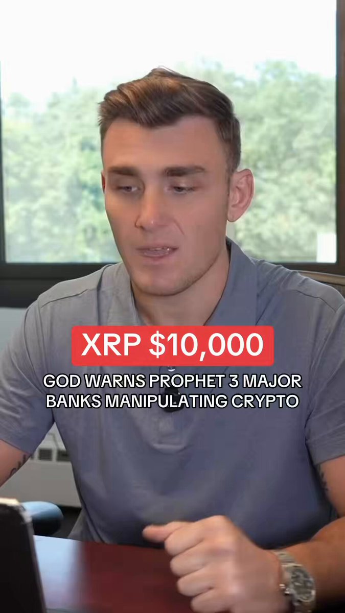 The image features a man sitting at his desk with a laptop, seemingly discussing the recent comments made by the man in the post. The post's caption describes a vision of three major banks manipulating cryptocurrency. The man in the image also referred to this vision when talking about Bitcoin and XRP. He specifically mentioned XRP as it had been manipulated into being worth $150 or $10,000, which would allow these banks to gain significant control over the digital currency market.