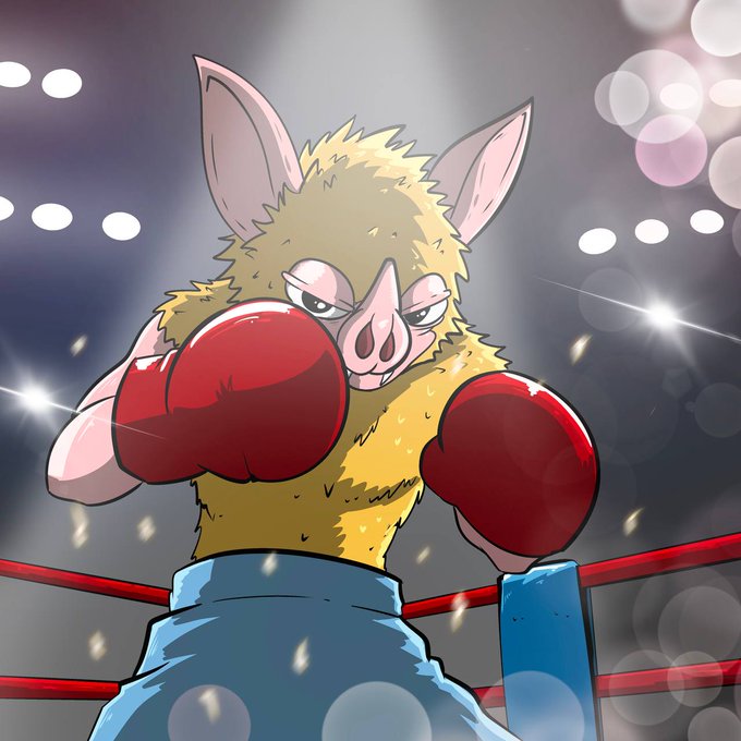 A cartoon bat character wearing red boxing gloves and blue shorts stands in a fighting stance inside a boxing ring, illuminated by dramatic overhead arena lights. The image complements the "hoodrat is locked in" caption by depicting a fierce, ready-to-fight critter channeling intense focus and determination in the ring.