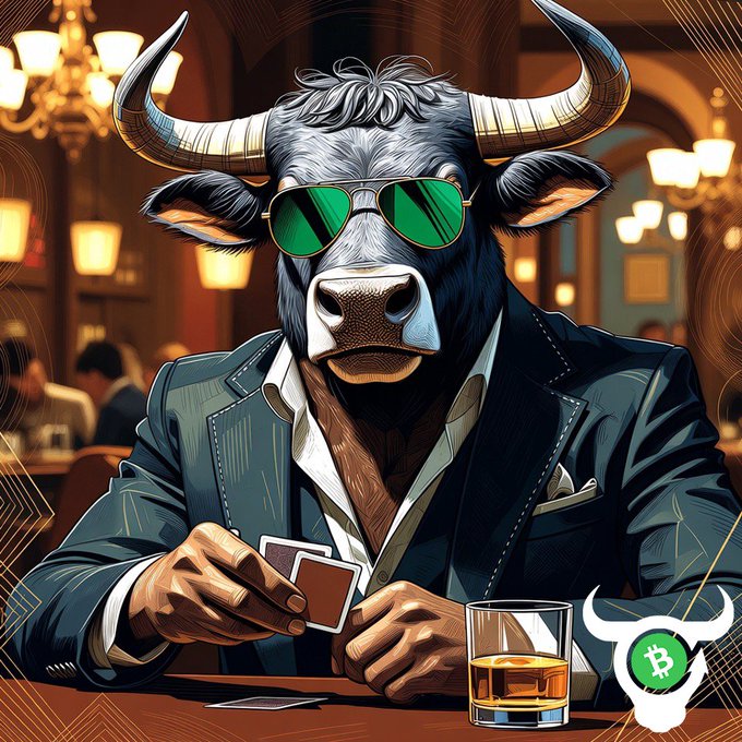 The image features a bull wearing sunglasses and a suit, sitting at a bar or table while holding a deck of cards. The bull appears to be playing poker with a drink in front of him, possibly a glass of whisky. There are other people present in the scene as well, suggesting that this is a social gathering or event.