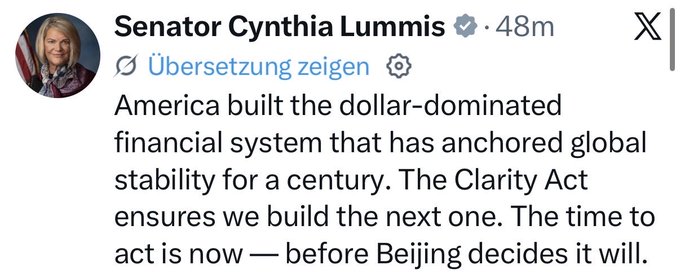 The image features a post from a person named Cynthia Lummis, who has written an article about the dollar's dominance in the global financial system. The post includes a quote from a Senate member that reads, "America built the dollar-dominated financial system that has anchored global stability for a century." This quote is attributed to Cynthia Lummis and is part of her message. The image also contains text that says "The new era of finance has begun," which suggests that there might be a shift in the way money operates or changes are happening in the financial world. Additionally, the post mentions Bitcoin as an example of a currency that is not tied to any country's government and is not controlled by any central authority.