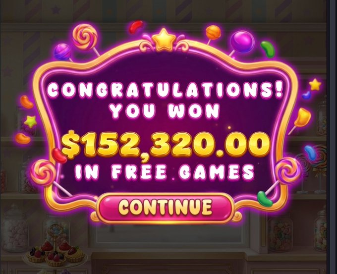 A casino slot machine win notification displaying "CONGRATULATIONS! YOU WON $152,320.00 IN FREE GAMES" with a "CONTINUE" button on a colorful candy-themed background.