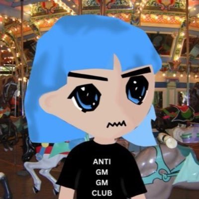 An animated cartoon avatar with blue hair and large eyes wears a black t-shirt reading 'ANTI GM GM CLUB' while standing in front of a carousel.