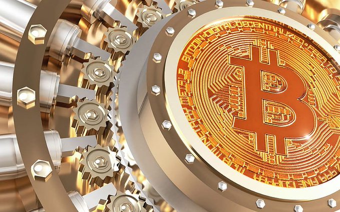 A 3D rendering of a golden Bitcoin emblem surrounded by metallic gears and mechanical parts.