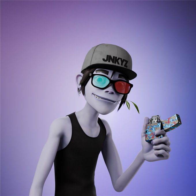 A 3D-rendered blue-skinned character with a wide grin and a leaf in its mouth, wearing 3D glasses (one cyan lens, one red lens) and a 'JNKYZ' cap, while holding a colorful, paint-splattered handgun.