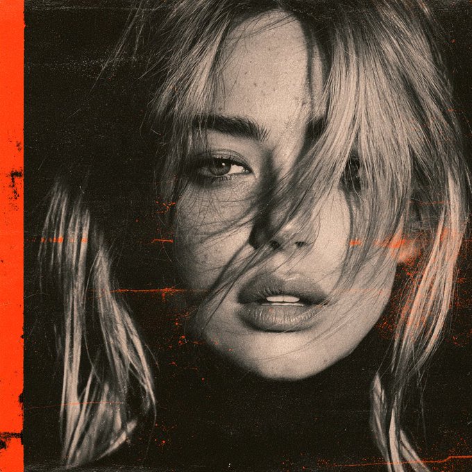 A stylized black-and-white portrait of a young woman with tousled blonde hair and a nose ring, accented with orange distressed textures.