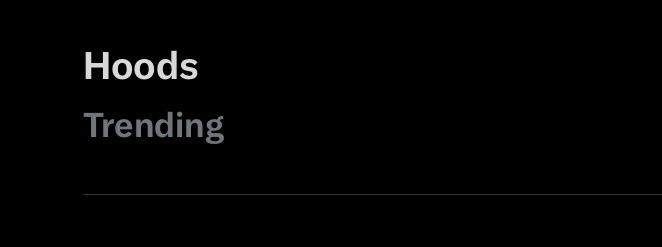 A black screen displaying the text "Hoods" in bold white and "Trending" in gray below it. The image appears to reflect the post's sentiment about "hoods up" being a trending topic, visually confirming the social media trend.