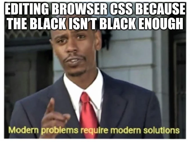 The image features a man wearing a suit, giving him an air of professionalism or authority. The caption reads "Editing browsers CSS because the black isn't black enough", which seems to be a humorous take on the current state of web browsers and their compatibility with CSS. The image also includes text that says "Focus on what is in the image and how it relates to the post".