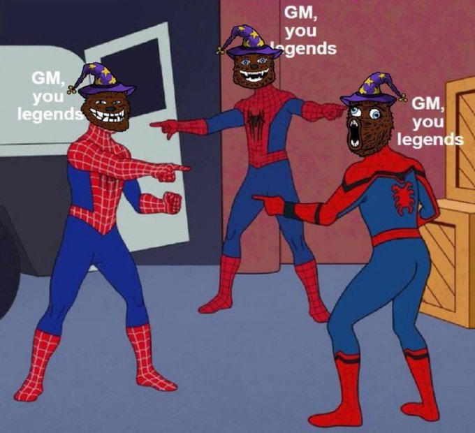 Three Spider-Man figures wearing wizard hats have been edited with grinning bear faces and point at each other, each captioned "GM, you legends," playfully tying into the post's celebration of $FUZZY on the XRPL. The meme humorously mirrors the post's enthusiastic energy about the $FUZZY card portal launch.