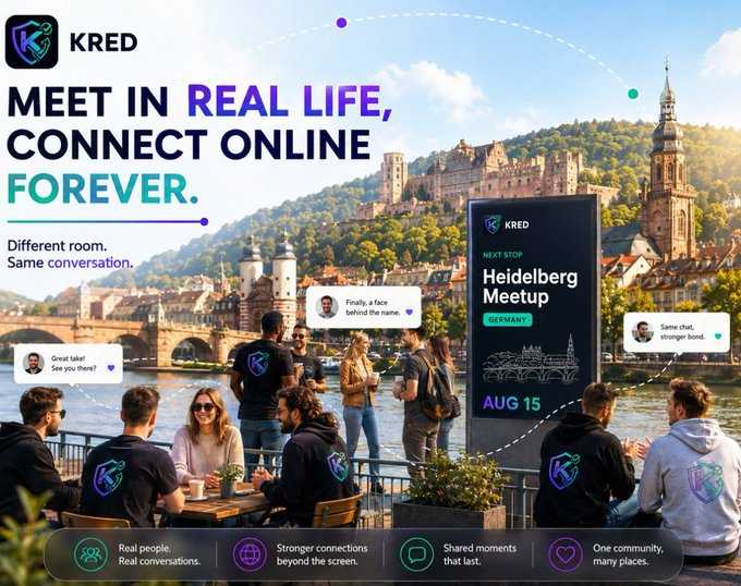 A group of KRED-apparel-clad attendees gather riverside in front of a Heidelberg castle backdrop, beneath a digital billboard advertising a "Heidelberg Meetup — Germany — Aug 15," with tagline "Meet in Real Life, Connect Online Forever," visually tying KRED's real-world community meetup concept to the post's praise for Africa's grassroots Web3 builders.