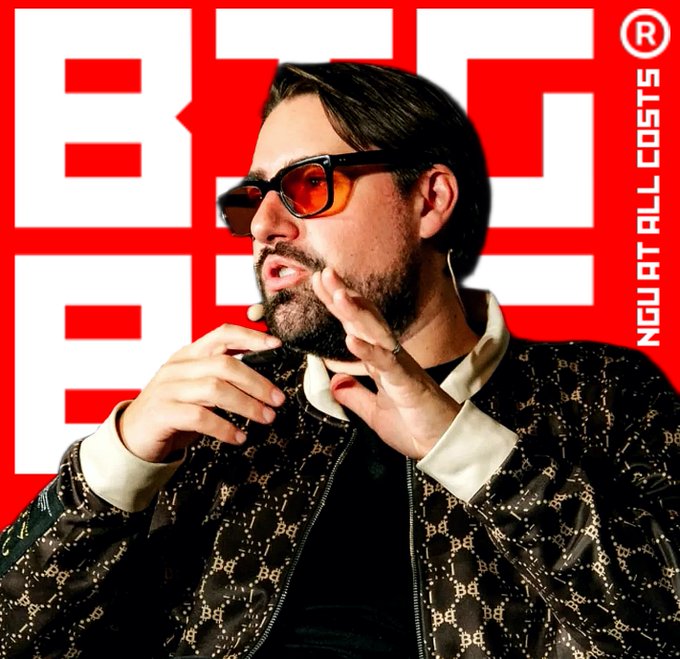 A man with a beard wearing orange sunglasses and a patterned jacket, with the word 'NGU AT ALL COSTS®' displayed on a red and white background.