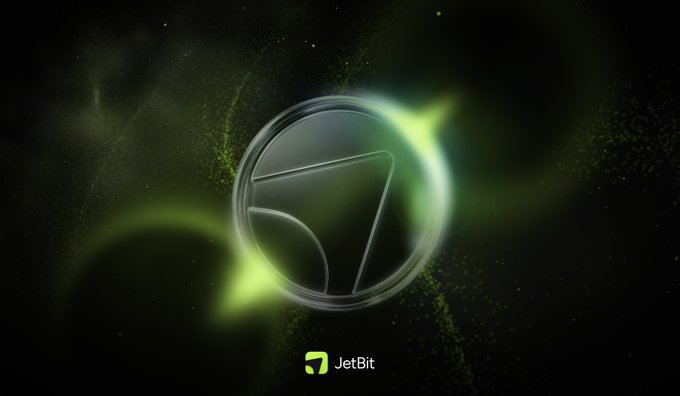 A stylized "J" logo encircled by a glowing green cosmic aura appears against a starry black background, with the JetBit brand name and logo displayed below — visually reinforcing the post's emphasis on JetBit being a live, operational perp DEX whose native $JET token is now entering public sale on BSC.