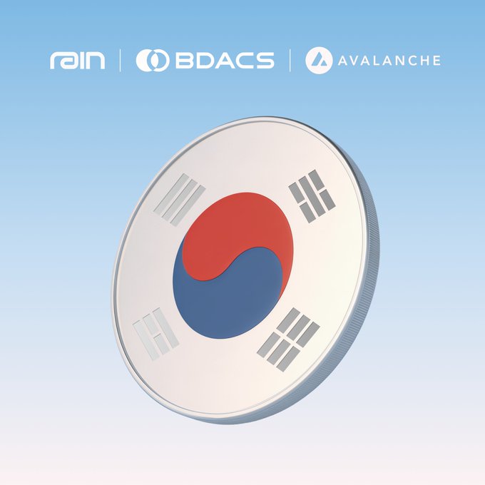 A 3D rendering of a silver coin featuring the South Korean flag design, set against a light blue gradient background with logos for 'rain', 'BDACS', and 'AVALANCHE' displayed at the top.