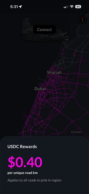 This image shows the Bee App interface with a map of Dubai and Sharjah highlighted with pink roads, indicating where users can earn "$0.40 per unique road km" in USDC Rewards.
