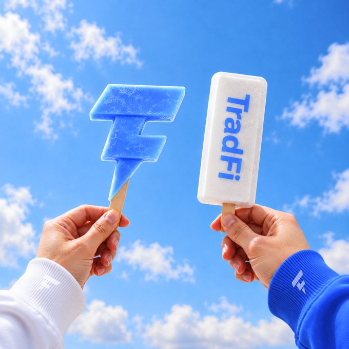 Two hands holding ice pops against a blue cloudy sky, with one blue ice pop shaped like a lightning bolt and a white ice pop displaying 'TradFi!' in blue text.
