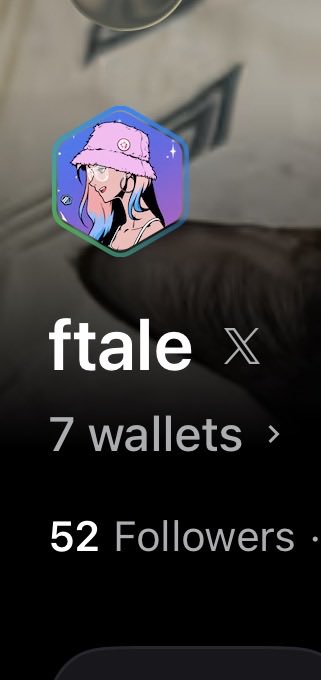 A mobile profile view of a user named 'ftale' with an anime-style avatar featuring a character in a bucket hat, showing 7 wallets and 52 followers.