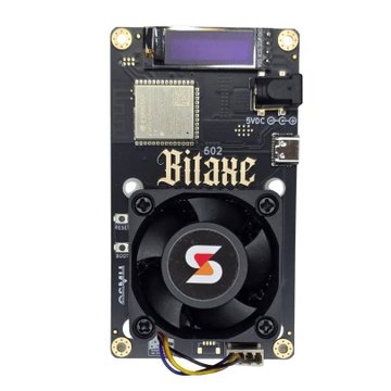 A Bitaxe Gamma Bitcoin solo miner with an LCD screen and cooling fan, labeled "Bitaxe," representing the $150 device used by a solo miner to successfully solve a Bitcoin block in July 2026 and earn over 3 BTC.