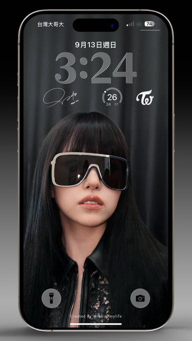 This image shows an iPhone lock screen wallpaper featuring MINA, a member of the K-pop group TWICE, wearing stylish white-framed sunglasses against a dark background, with the time displayed as 3:24 and the date "9月13日週日" (Sunday, September 13). The wallpaper includes a calendar widget showing the 26th, signature graphics, and the "TW" TWICE logo, aligning with the #MINA Instagram post theme.