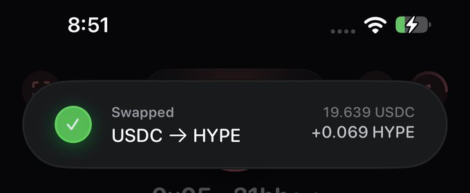 An iOS notification on a lock screen showing a successful swap of 19.639 USDC for +0.069 HYPE on a crypto application.